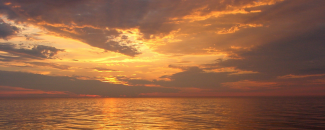 Photo of golden sunset over Atlantic Ocean