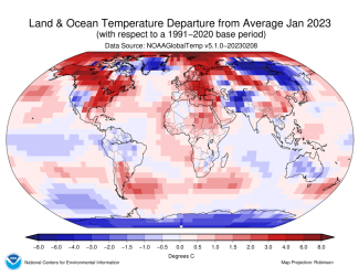 Global map showing land and ocean temperature departure from average for January 2023 with warmer areas colored in gradients of red and cooler areas in gradients of blue.