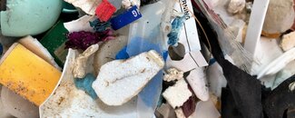 Heap of small ocean debris collected during a beach cleanup in Provincetown, MA.