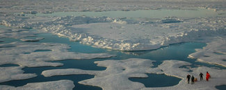Aerial photo of researchers on Arctic sea ice