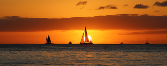Picture of sailboats in Hawaii at sunset
